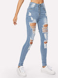 Ripped Bleach Wash Skinny Jeans