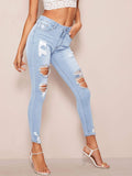 Distressed Faded Skinny Jeans